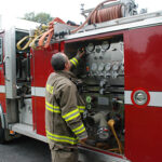 close up of firefighter at truck