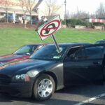 no u turn sign through windshield