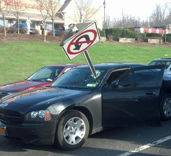 no u turn sign through windshield
