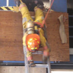 firefighter on ladder